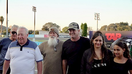 John Street, second from left, joins in the celebrations with Dave Phillips.