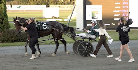 Trackside presenter Nicole Sims interviews driver Harrison Orange after their off-the-canvas win.