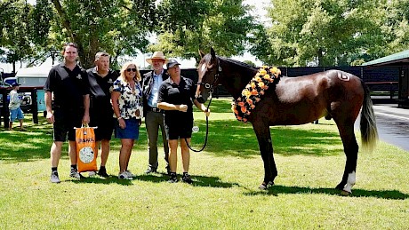 Ken and Karen Breckon, second and third from left, with their best presented colt.