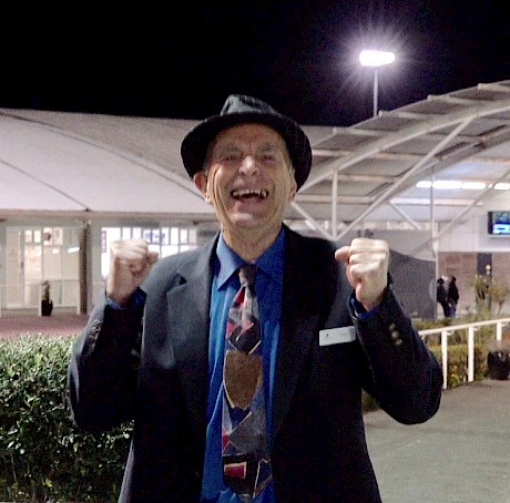 “At last!” ATC steward and part-owner Pat Gubb strides into the winner’s circle.